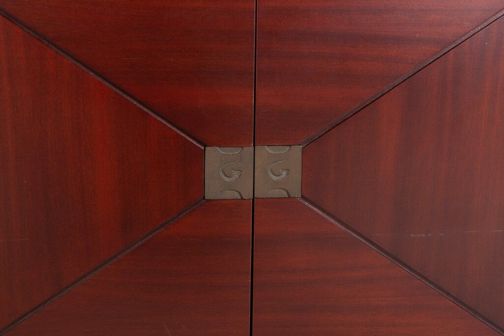 Vintage bar cabinet with brass markings