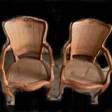 Pair of convertible armchairs in walnut and TBE canework