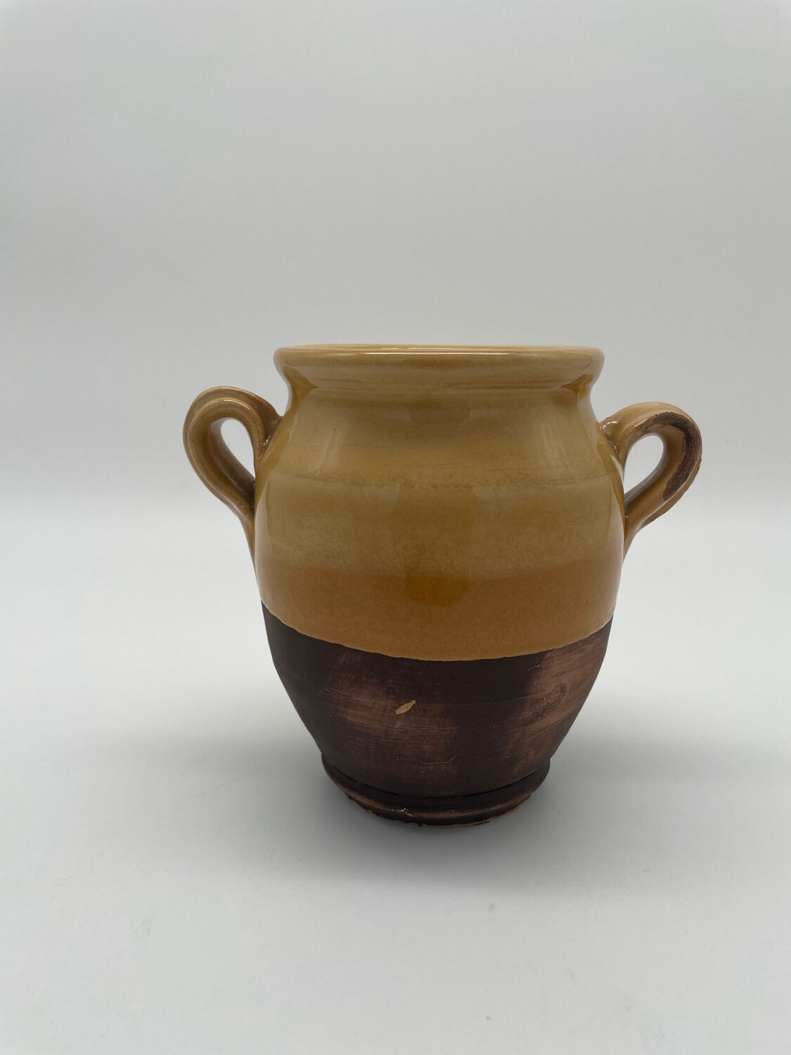 Varnished yellow terracotta confit pot