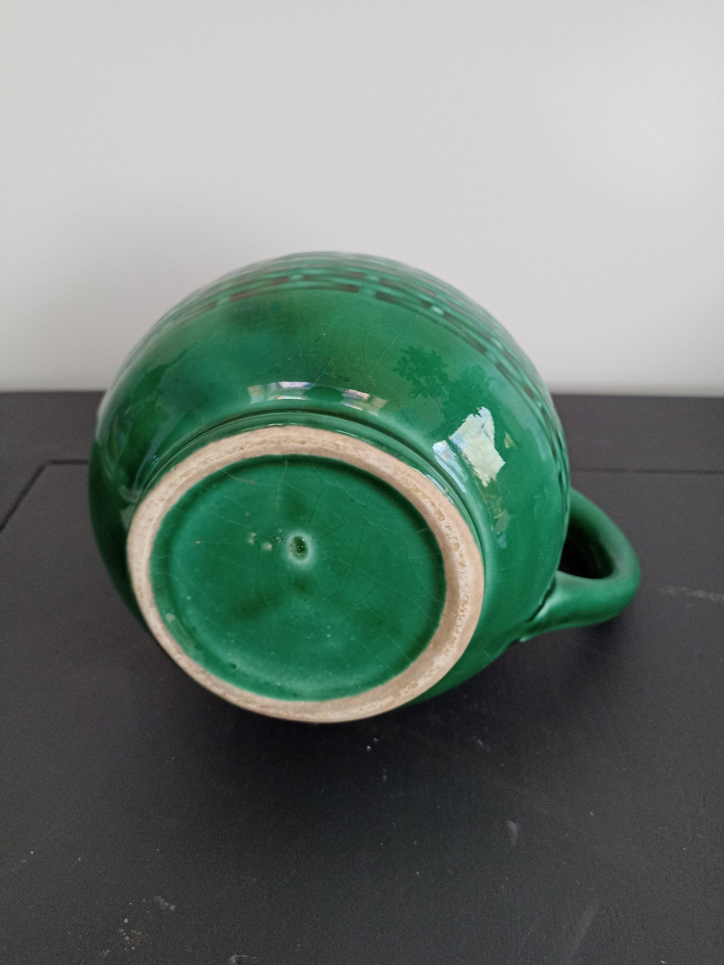 Antique ceramic milk pitcher