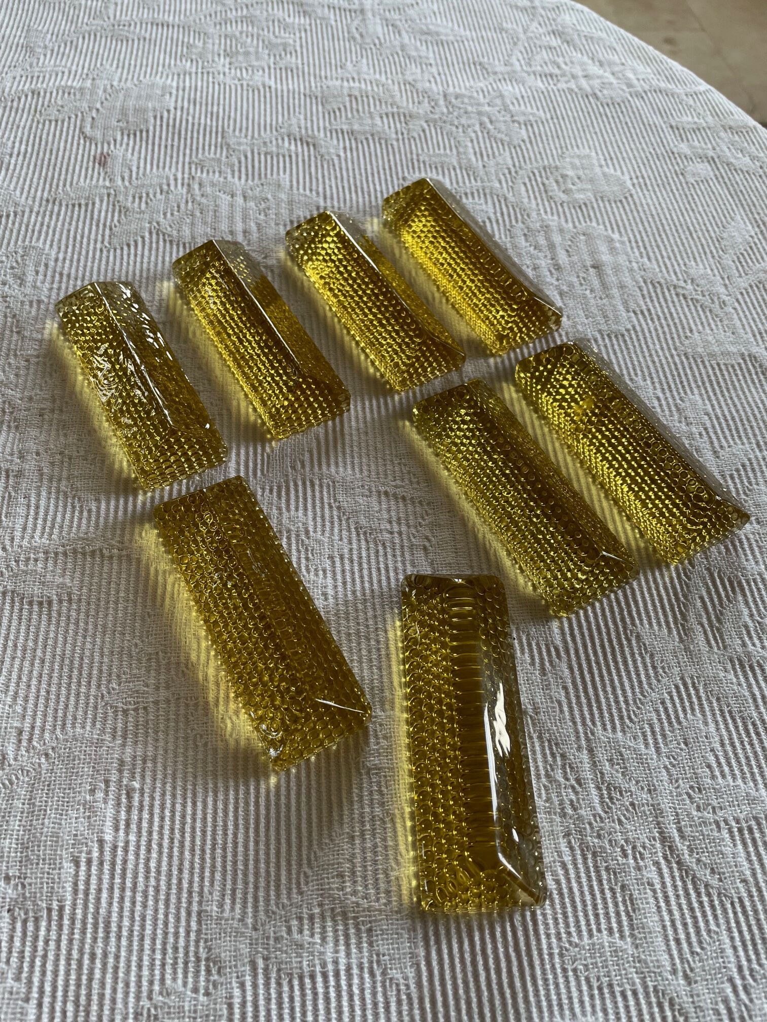 Set of tinted glass knife rests