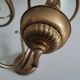 Antique brass wall sconce with two arms, Louis XV style.
