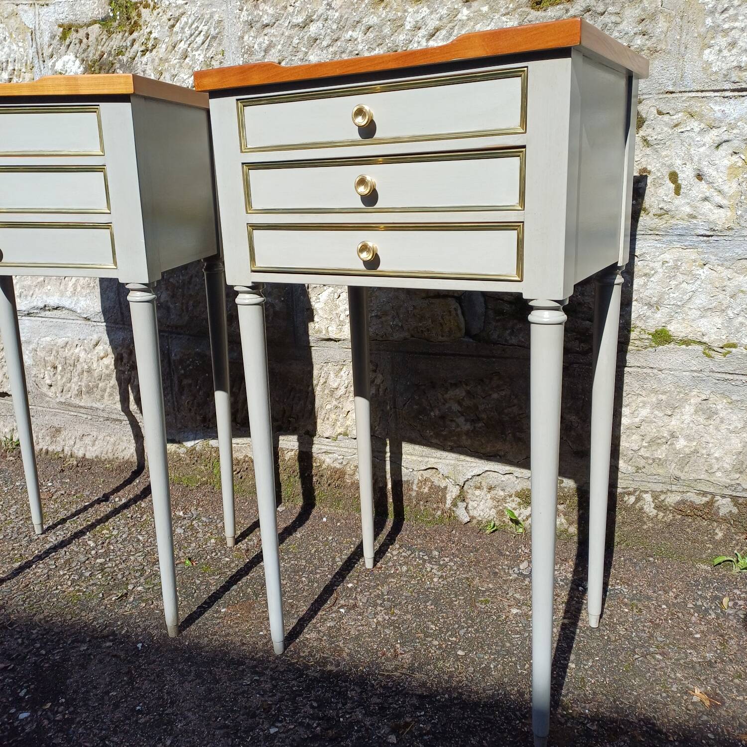 Pair of patinated bedside tables in Louis XVI style