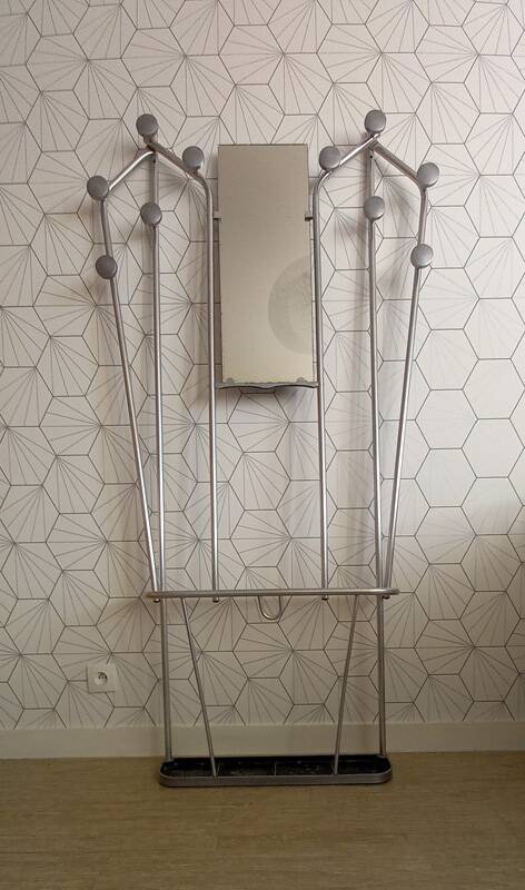 Vintage aluminum wall coat rack.