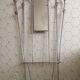 Vintage aluminum wall coat rack.