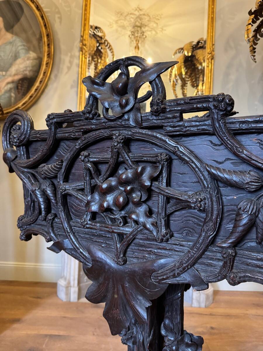 Carved wooden jardinière, Black Forest work, 19th century.