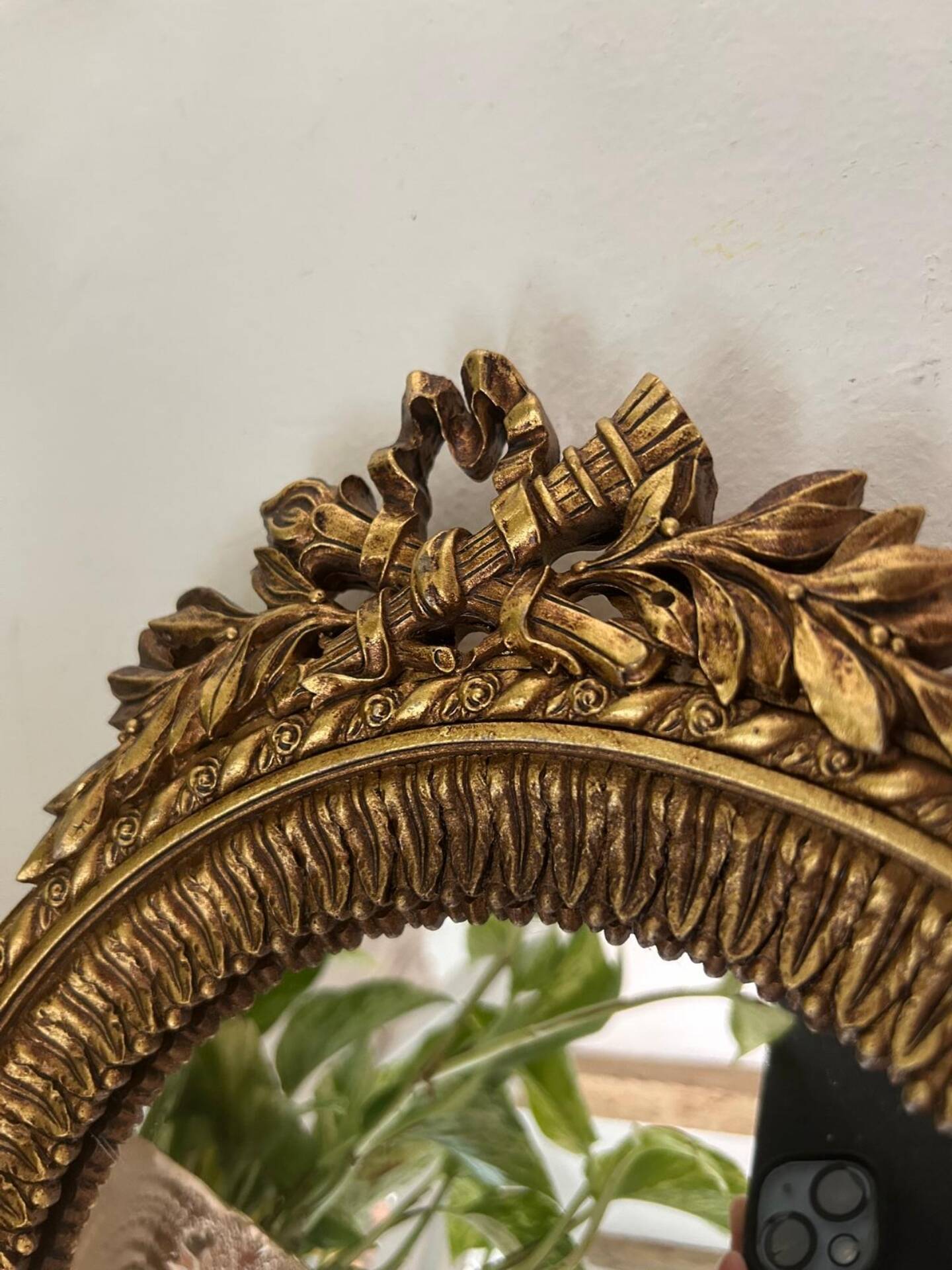 Round golden convex mirror with mouldings - witch's mirror