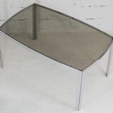 Living table. chrome metal, curved smoked glass slab, france, circa 1970.
