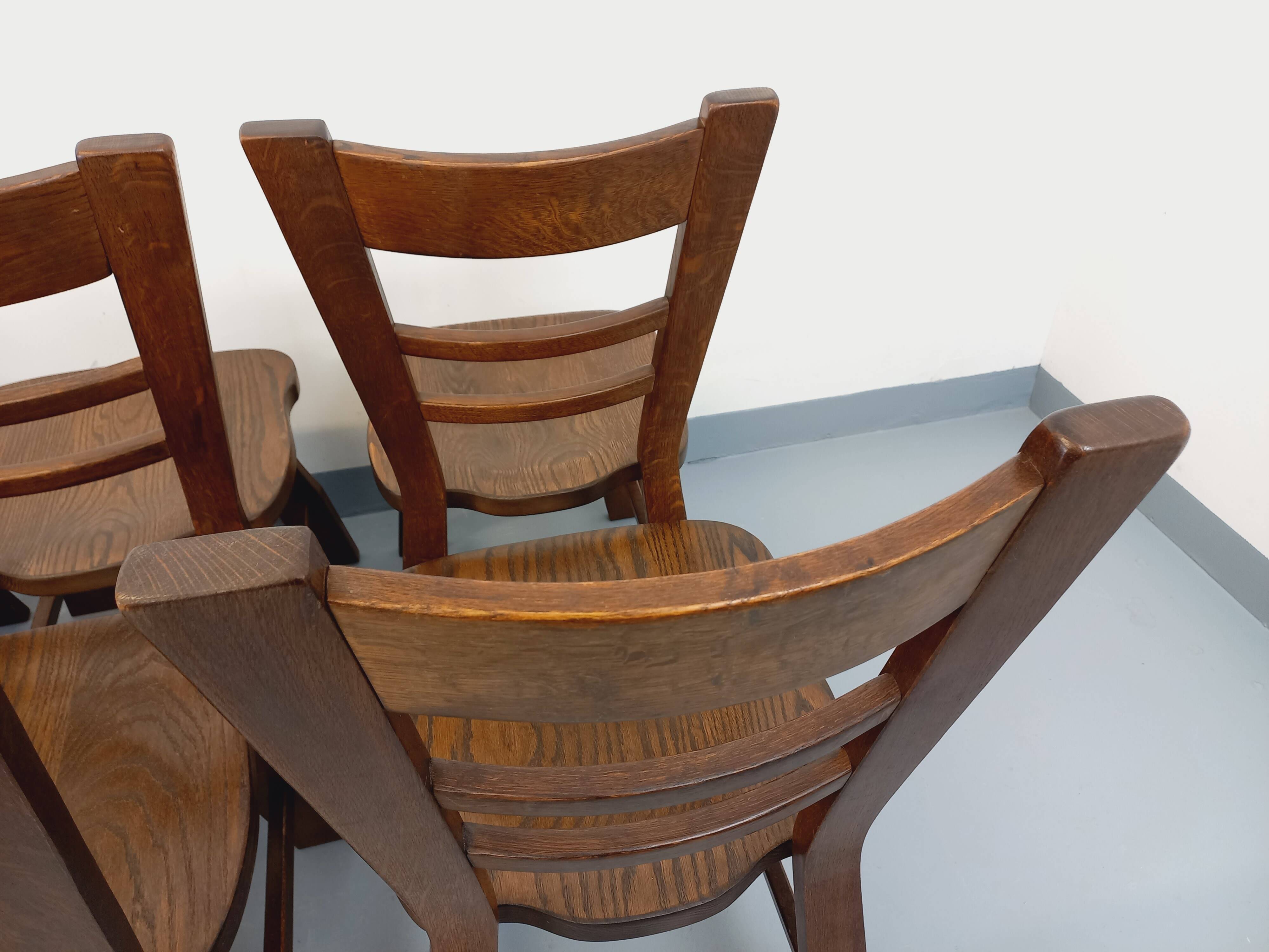 Set of 6 vintage brutalist oak chairs from the 1950s.
