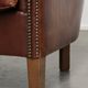 Set of 2 sheepskin club armchairs in a dark cognac colour