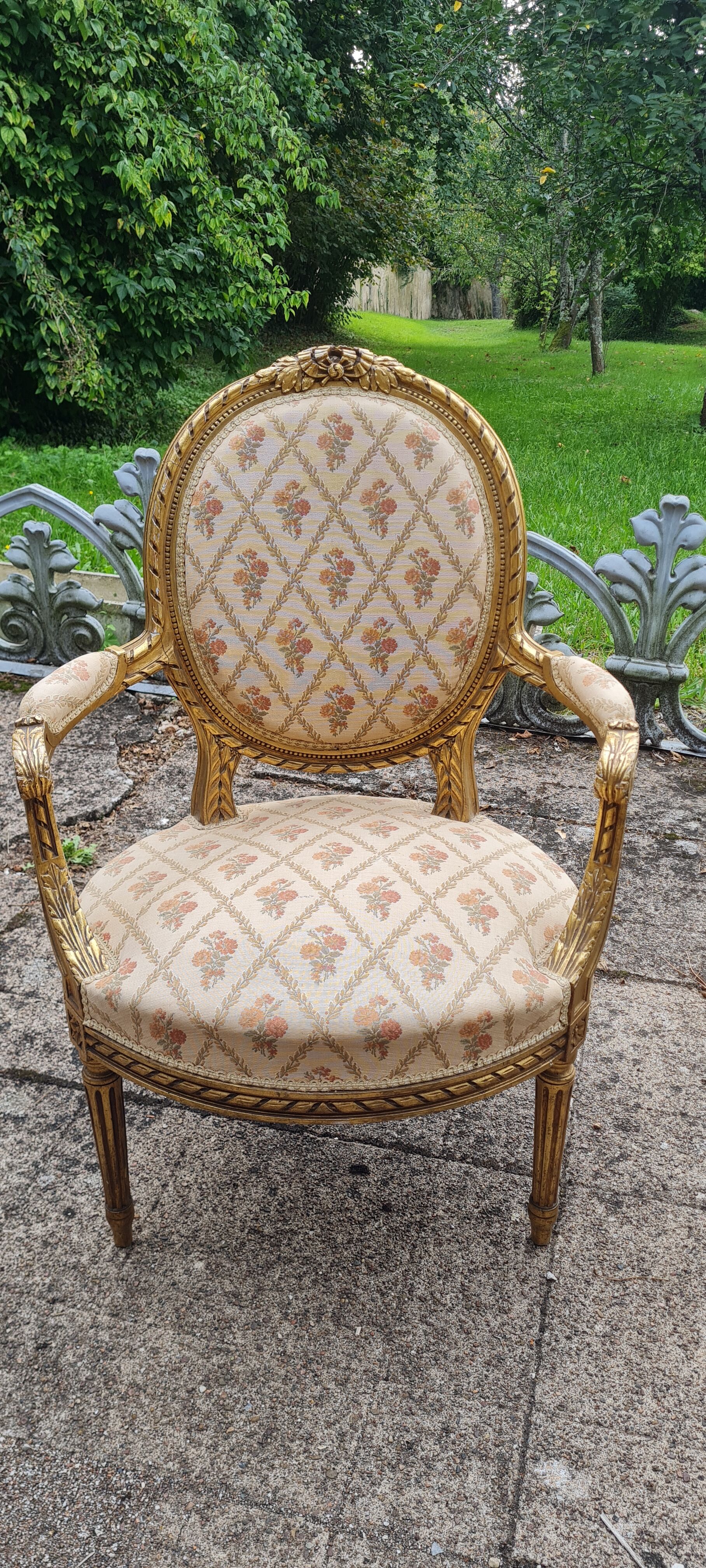 Pair of armchairs medallion in gilded wood Louis XVI style