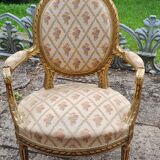 Pair of armchairs medallion in gilded wood Louis XVI style
