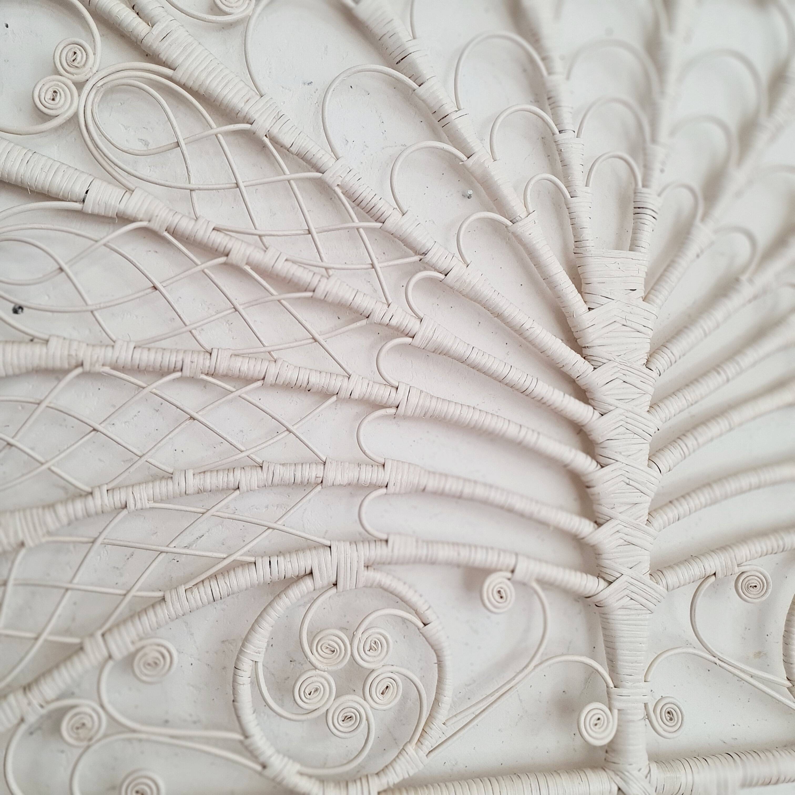 Peacock headboard in white rattan