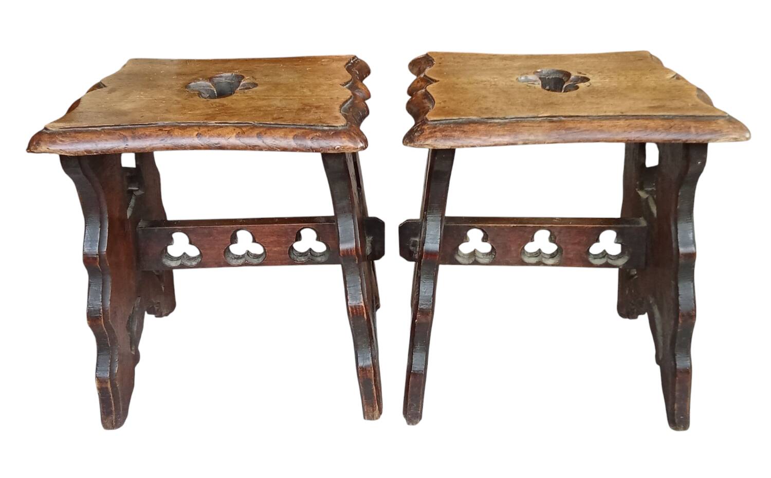 Pair of antique carved wooden stools