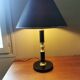 Vintage lamp base in black leather and brass