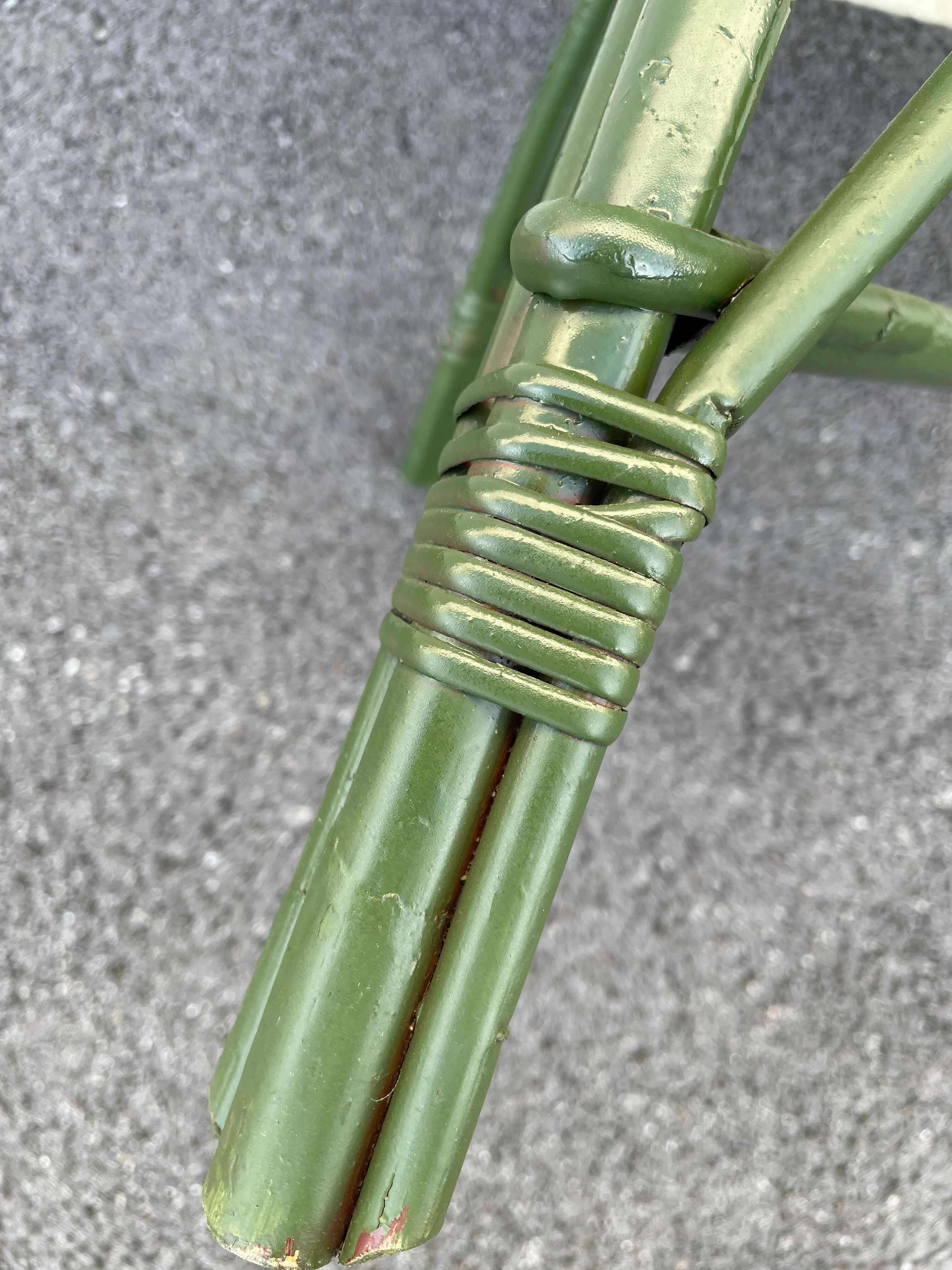 Green rattan armchair