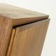 Narrow teak bookcase with two doors by Omann Jun, 1970s