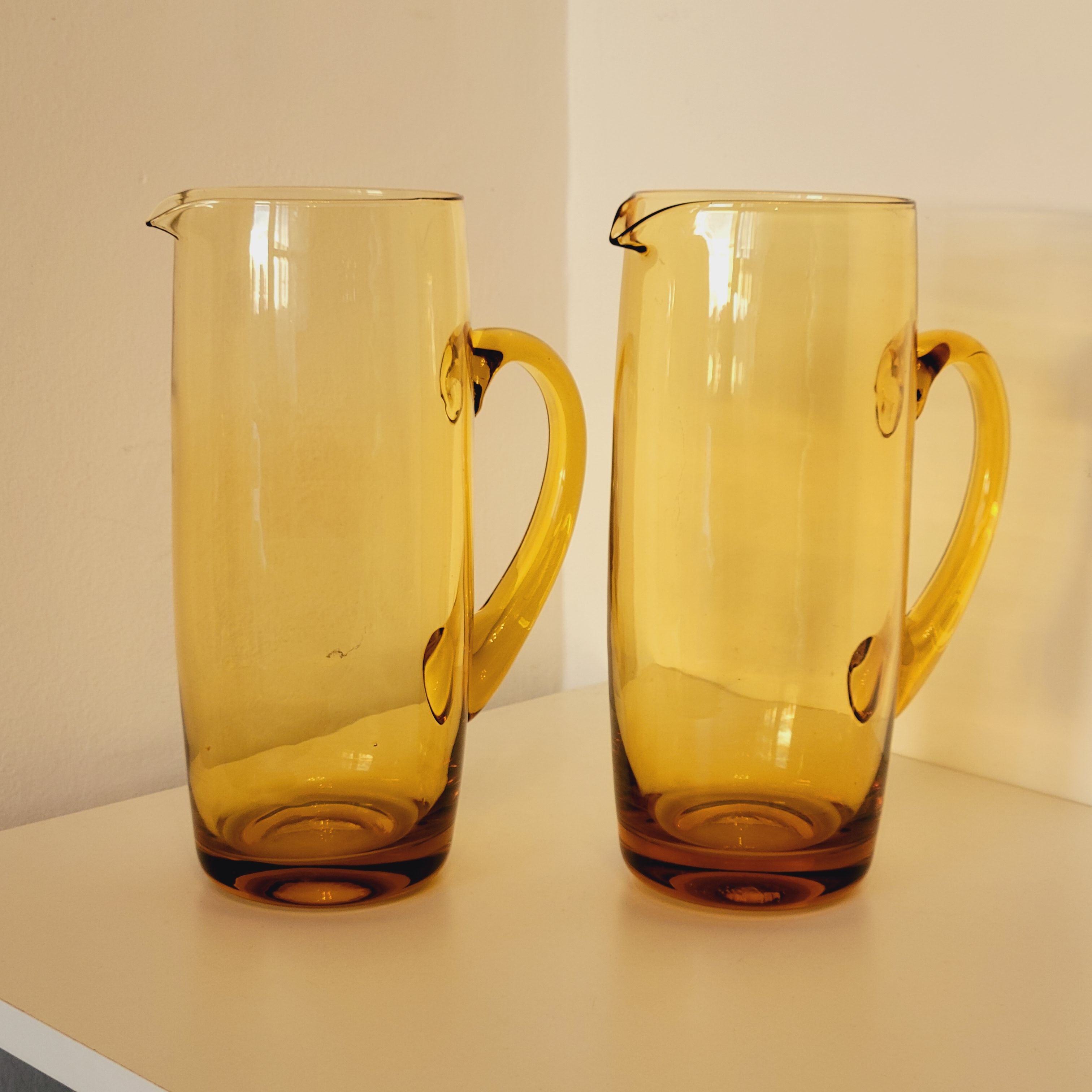 2 carafes in vintage amber yellow blown glass