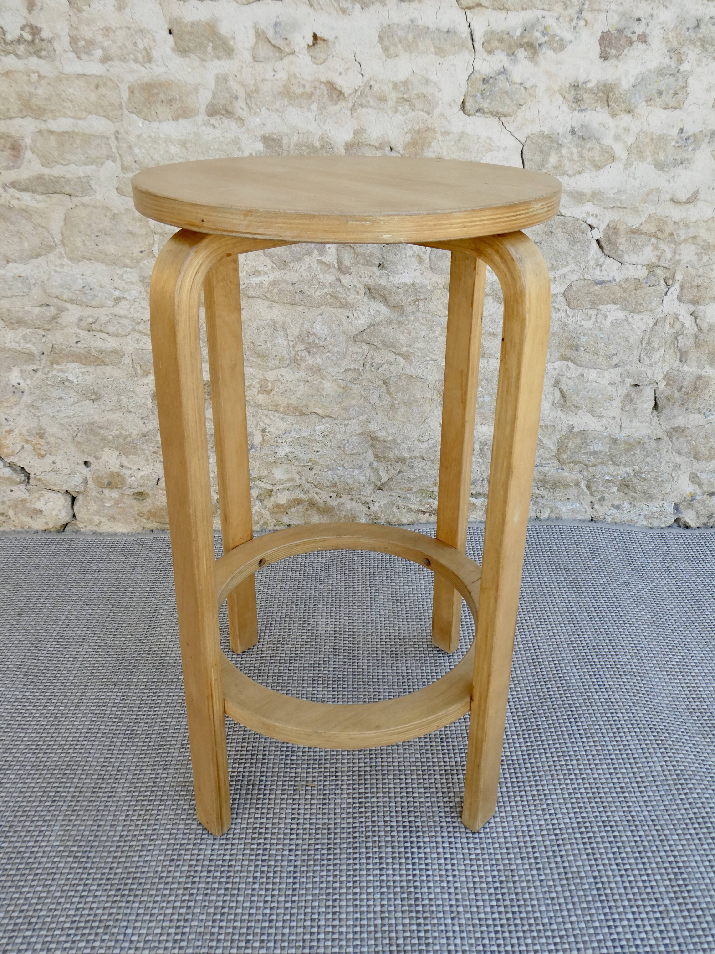 High wooden tabouret