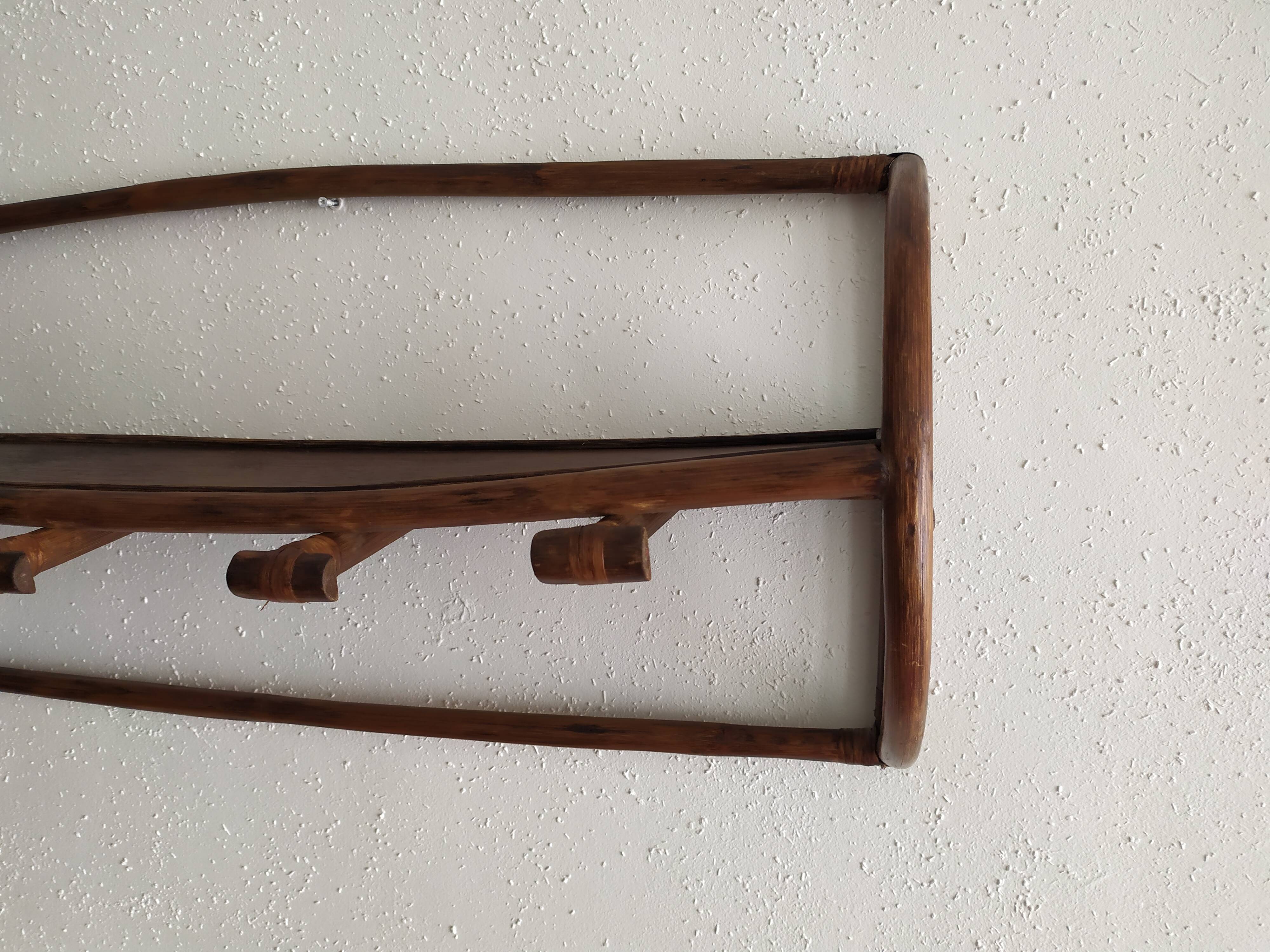 Rattan wall coat holder