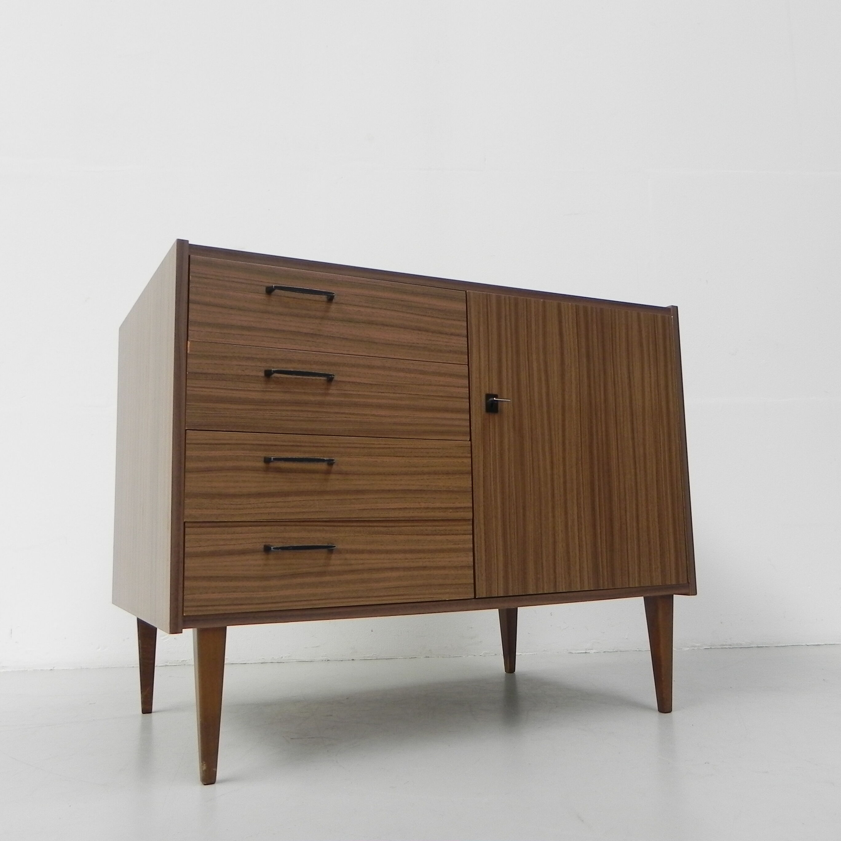 Vintage chest of drawers on tapered legs