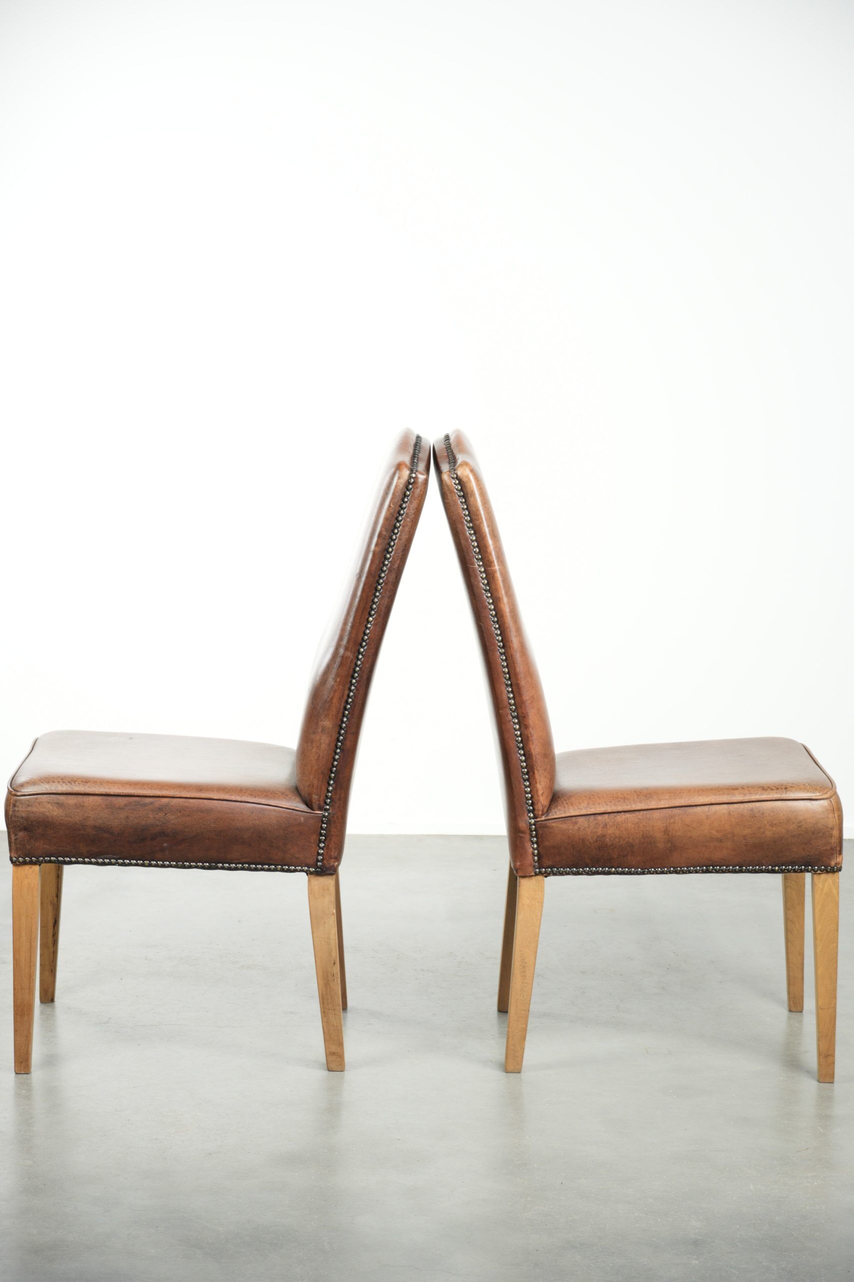 Set of 6 vintage dining chairs made of sheepskin leather with a high back