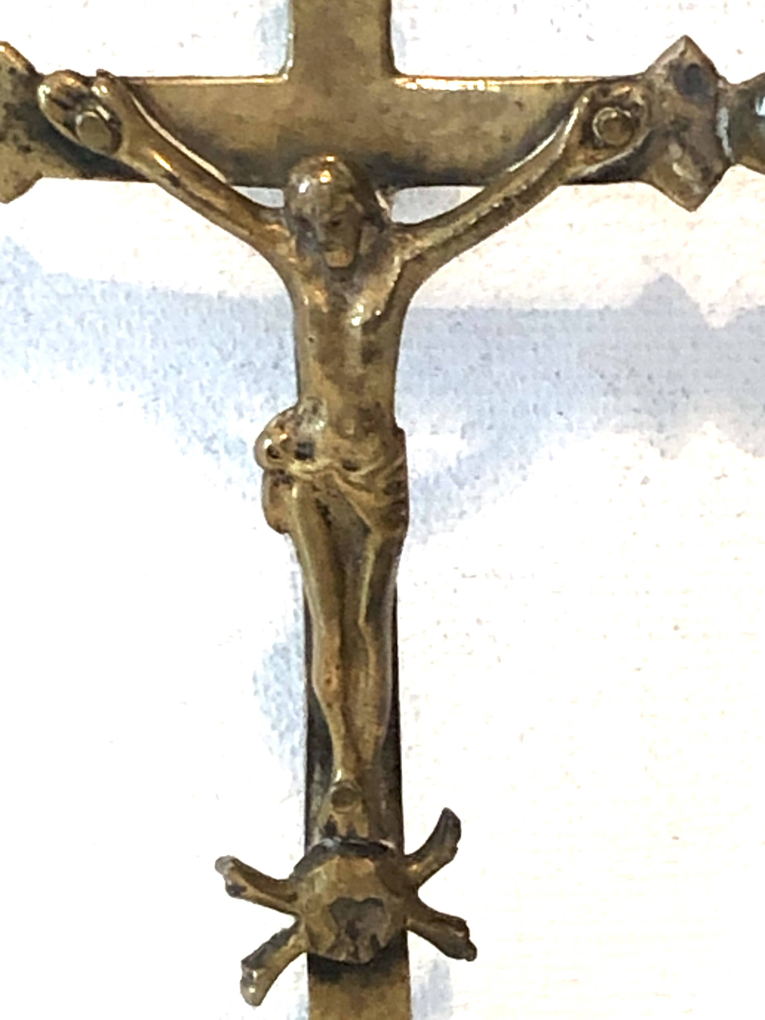 Old golden brass crucifix