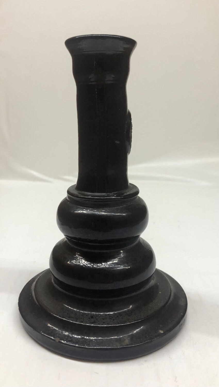 Black ceramic candlestick and escutcheon