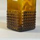 Amber glass and wood bottle