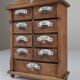 Cabinet à épices en bois rustique espagnol avec étiquettes en céramique, années 1930