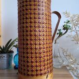 Thermos bottle with wicker canning