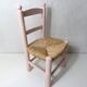 Old wooden straw chair for children