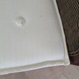 2 armchairs in woven rattan and wood, 1980s