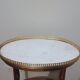 Saddle pedestal table with marble top in Louis XV style