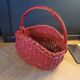 Red painted rattan basket