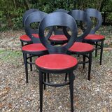 6 vintage Baumann seagull model chairs, black lacquered with red Skai seats.