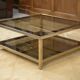 Hollywood Regency coffee table in smoked glass with mirrored framing from the 1970s.