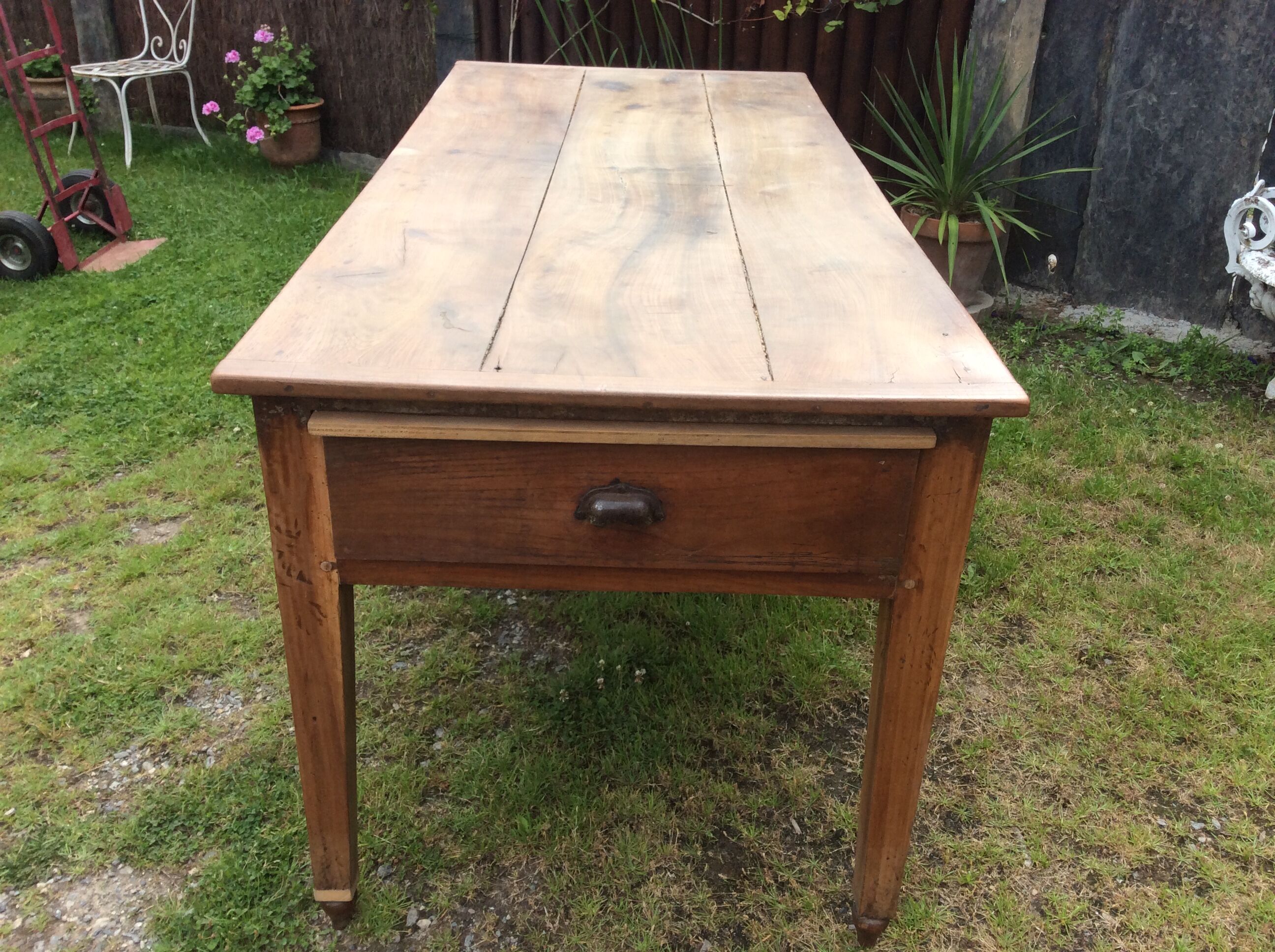 Farm table in cherry tree of the country of Redon with spindle feet.