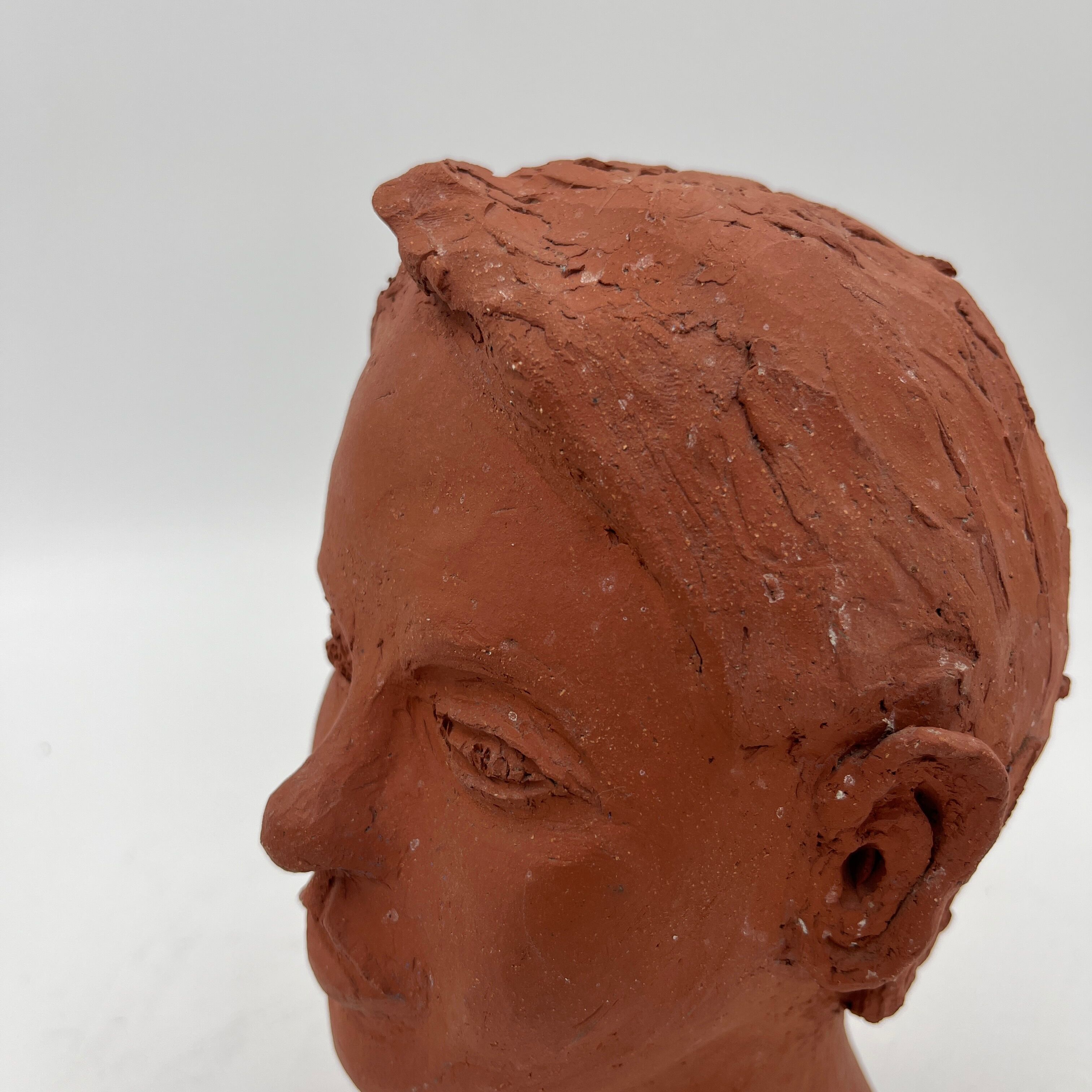 Terracotta child's head