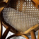 Curved wooden stool and cannage