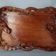 Ancient wooden tray carved with Chinese dragons around 1900