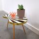 1950s kidney-shaped black and white table, plant table.