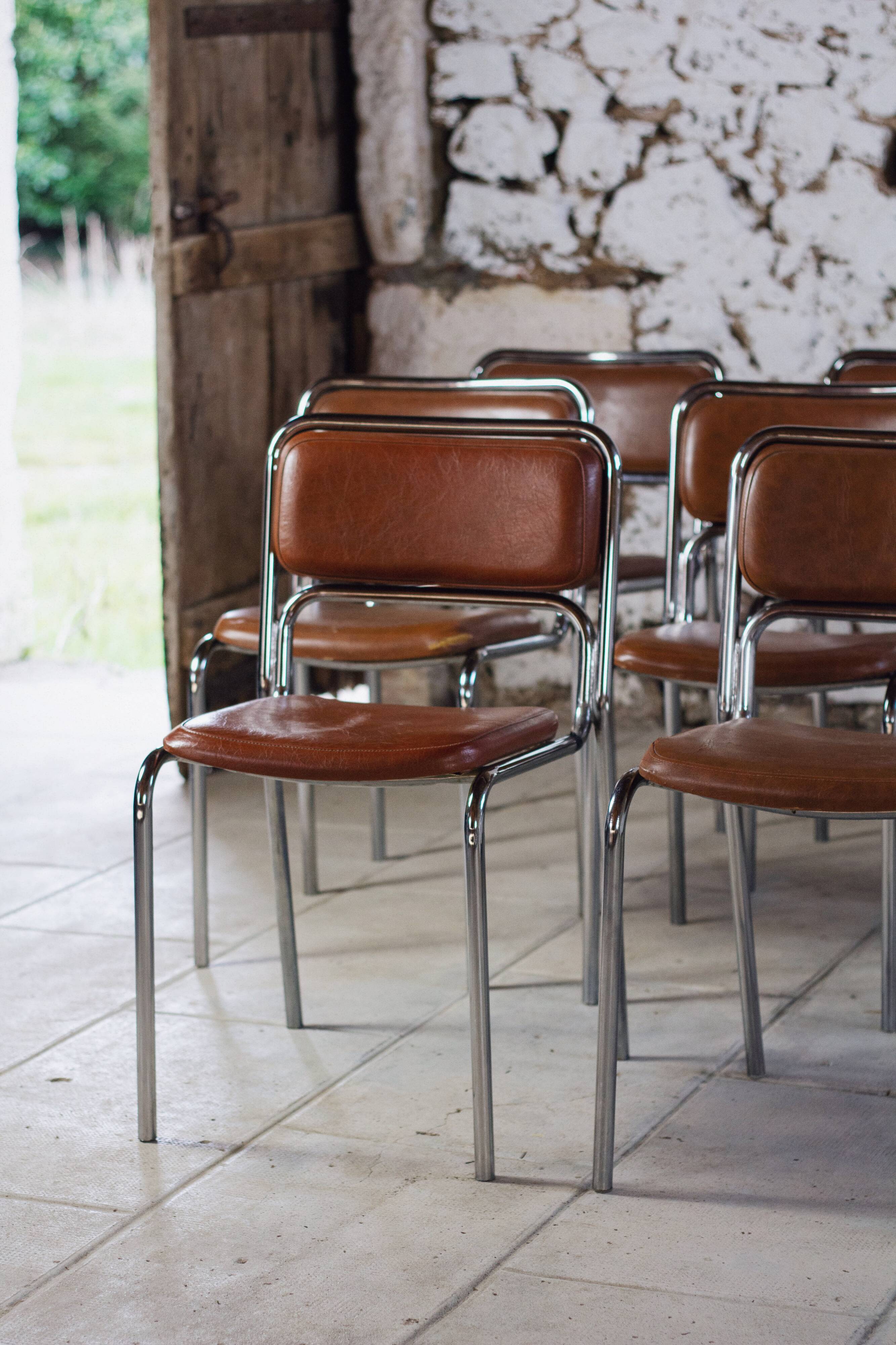 8 vintage tubular chrome and skai chairs, 1970