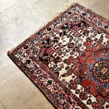 Persian carpet in wool and silk, old rose.
