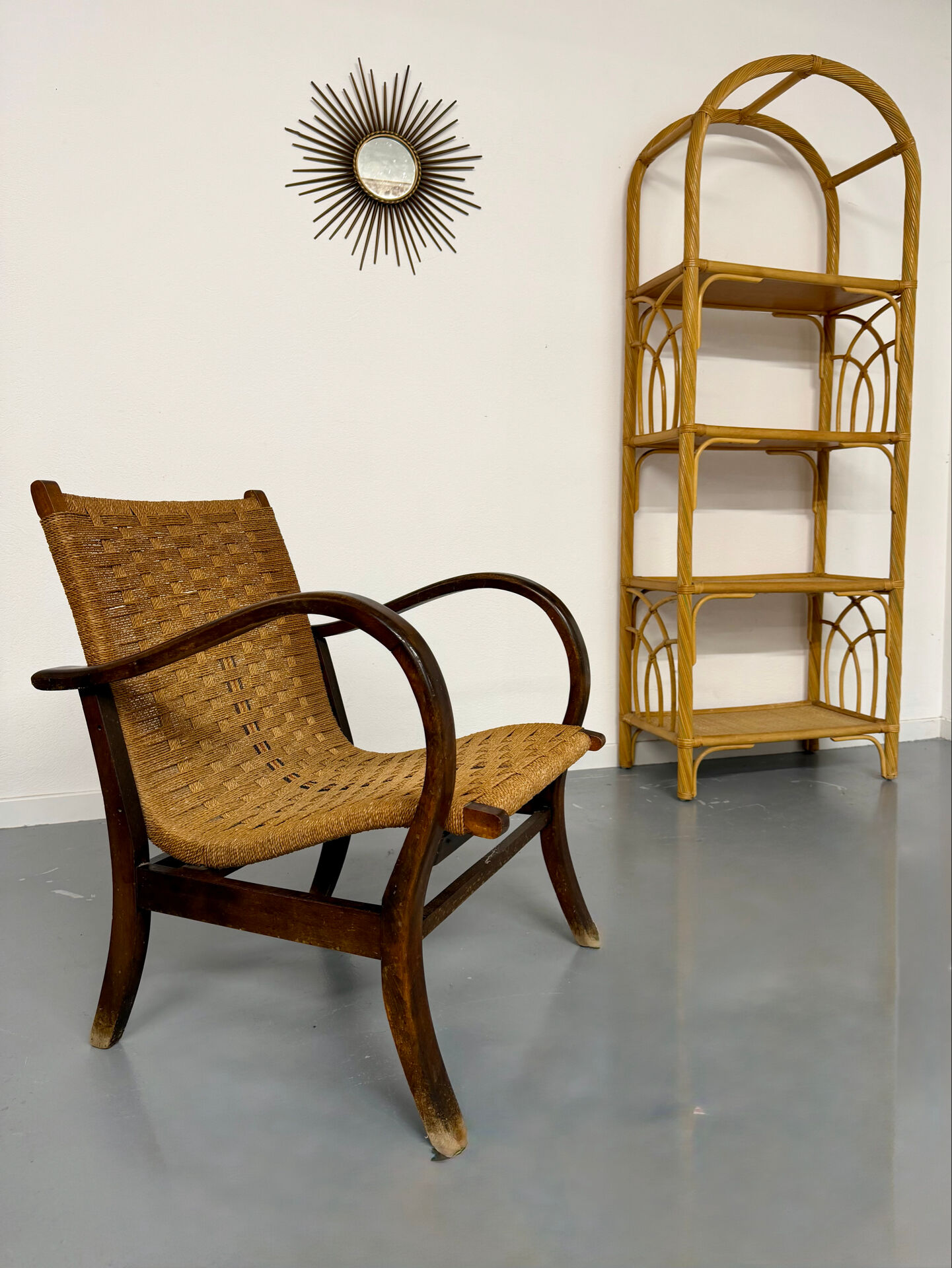 Large woven rattan bookshelf designed in the 1970s.