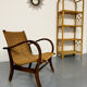 Large woven rattan bookshelf designed in the 1970s.