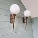 Pair of Art Deco wall sconces in brass and white opaline, 1930.