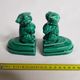 Pair of dog-shaped dog-shaped art deco dogs in green dabbling