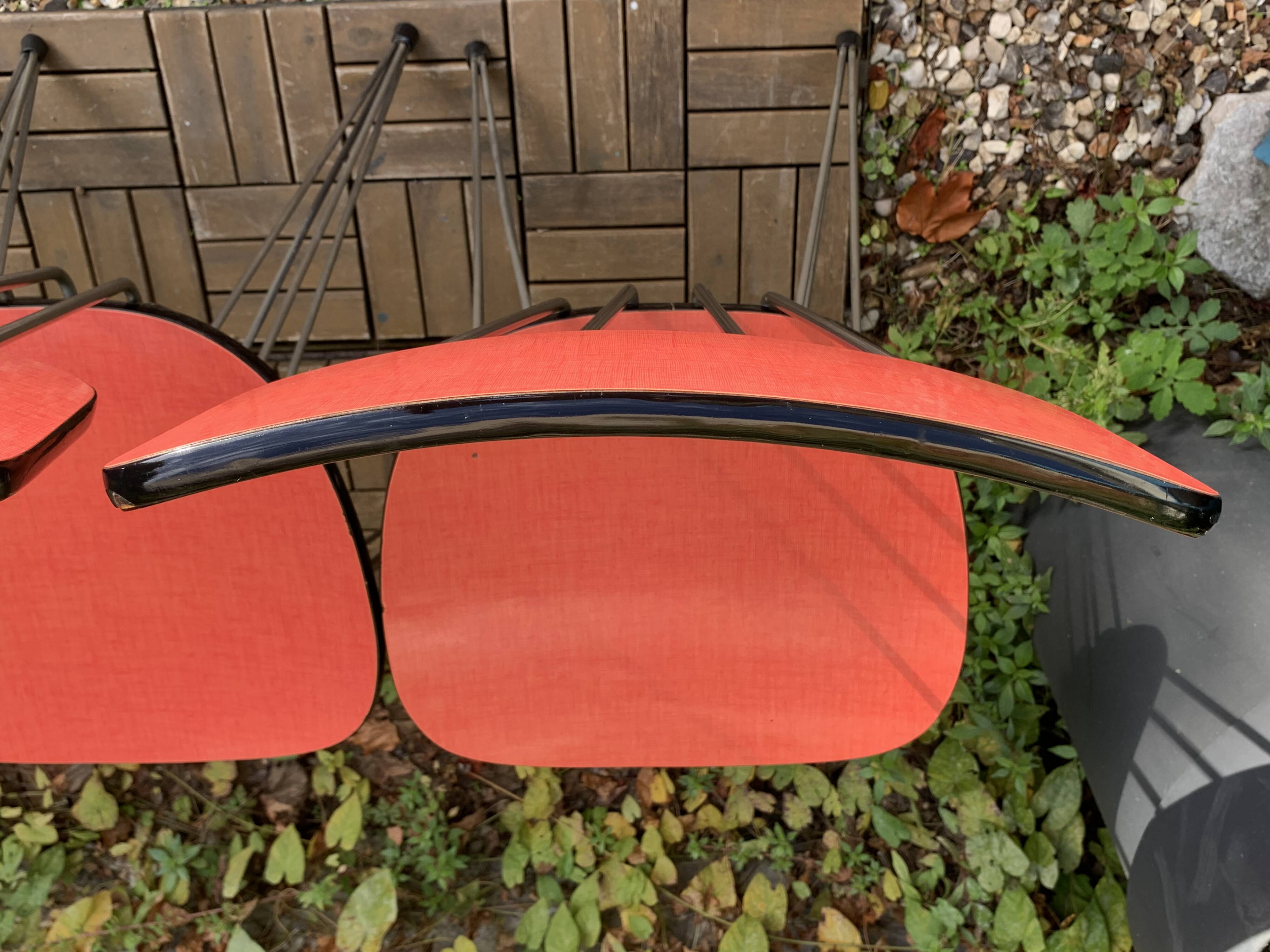 4 red Formica chairs with Eiffel legs, 1950s