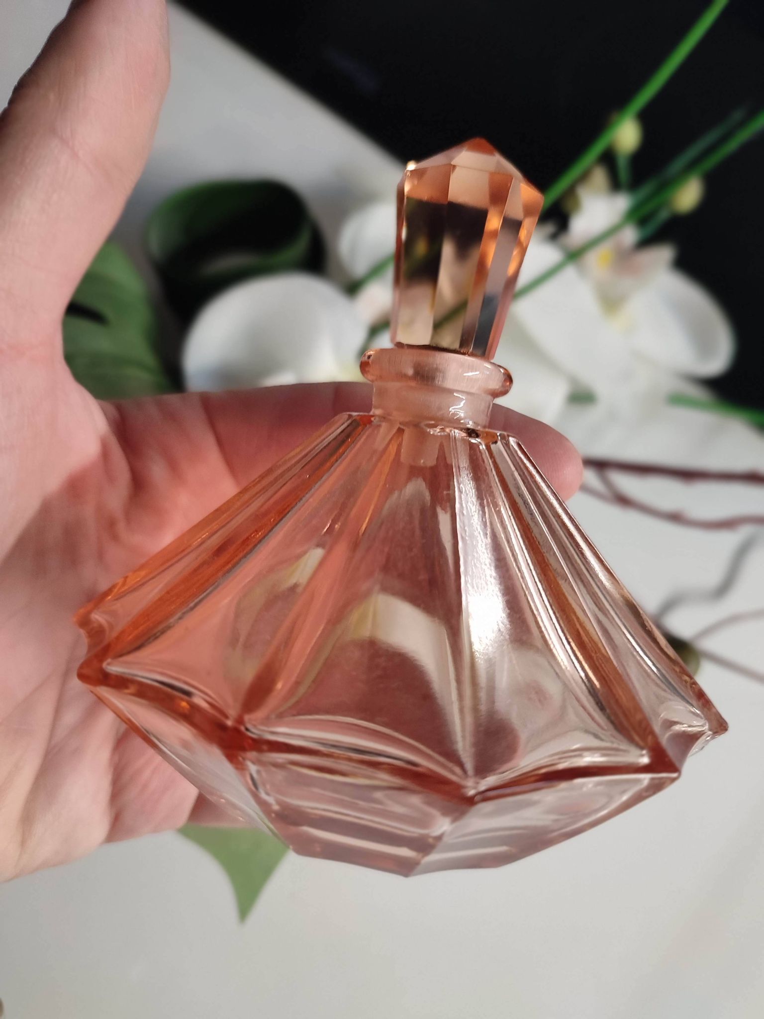 Vintage Art Deco perfume bottle in beautiful pink glass.